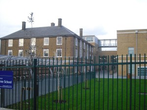 Greenwich Free School's pedestrian new buildings. The handsome 1930s Adair House has been restored but is not improved by the extensions built on two sides, which look like cheap blocks of flats thrown up by a slum landlord
